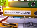 Target Management on Yellow Ring Binder. Blurred, Toned Image.