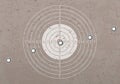 Target in a shooting range with bullet holes Royalty Free Stock Photo