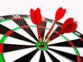 Target with three red dart focus on bull`s eye, Setting challenging business goals And ready to achieve the goal with teamwork Royalty Free Stock Photo