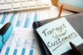 Target your customers written on a memo stick Royalty Free Stock Photo