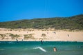 Kitesurfing on Valdevaqueros beach, Gibraltar Strait in Tarifa, Spain