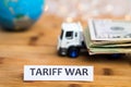 Tariff War shipping, trade and commerce concept with USA dollars loaded on truck bed Royalty Free Stock Photo