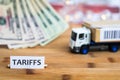 Tariff War shipping, trade and commerce concept with USA dollars loaded on truck bedTariffs shipping, trade and commerce concept w Royalty Free Stock Photo