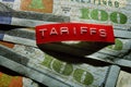 Tariffs label on new US hundred dollar bills Royalty Free Stock Photo