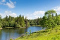 Tarn Hows near Hawkshead Lake District National Park England uk on a beautiful sunny summer day Royalty Free Stock Photo