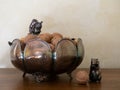 Tarnished Silver Bowl with Mixed Nuts and Squirrel Figurines Royalty Free Stock Photo