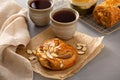 Taro filled butterfly bun with tea Royalty Free Stock Photo