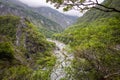 The Taroko National Park in Taiwan is an enchanting paradise that captivates the senses. Its majestic marble cliffs, cascading