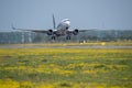 Tarom commercial airplane takeoff from Otopeni airport in Bucharest Romania Royalty Free Stock Photo