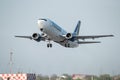 Tarom Timisoara Skyteam commercial airplane takeoff from Otopeni airport in Bucharest Romania