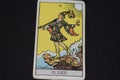 Tarot card number 0 represents THE FOOL in the tarot cards of the major arcana on a black background