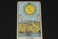 THE MOON Tarot card number 18 represents THE MOON in the tarot cards of the major arcana on a black background