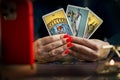 Tarot card reader arranges cards in a card spread. Fortune-telling concept Royalty Free Stock Photo