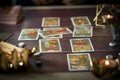Tarot card reader arranges cards in a card spread. Fortune-telling concept Royalty Free Stock Photo