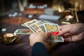 Tarot card reader arranges cards in a card spread. Fortune-telling concept Royalty Free Stock Photo