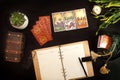 Tarot card reader arranges cards in a card spread. Royalty Free Stock Photo