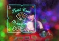 Tarot Card Readings Neon Sign in Window with Psychic Tarot Card Reader in background Royalty Free Stock Photo