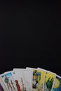 Tarot cards on a black surface - Vertical Royalty Free Stock Photo