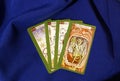 Tarot cards on blue textile