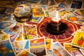 Tarot cards with a candle and crystal ball. Royalty Free Stock Photo