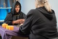 Tarot cards. fortune teller man holding a pack of tarot cards while shuffling them. Mystical session with client Royalty Free Stock Photo