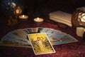 Tarot cards layout on witch table. Nine of Coins Pentacles.