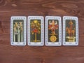 Tarot cards medieval close up, The Aces of Tarot Decks on wooden background Royalty Free Stock Photo