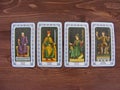 Tarot cards medieval close up, The Kings of Tarot Decks on wooden background