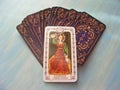 Tarot cards medieval close up with russian title Temperance, Art Tarot Decks on blue wooden background Royalty Free Stock Photo