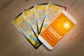 Tarot cards and mobile phone Royalty Free Stock Photo