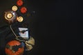 Tarot cards, pumpkins and candles. Halloween composition on Black background