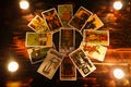 Tarot cards for tarot readings psychic as well as divination with candle light - fortune teller reading future or former and Royalty Free Stock Photo