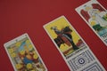 Tarot cards on the red surface - horizontal Royalty Free Stock Photo
