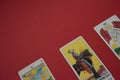 Tarot cards on the red surface - horizontal with copy space Royalty Free Stock Photo
