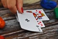 Tarot cards on the table. A woman fortune-teller predicts the future.