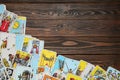 Tarot cards on wooden table, top view. Space for text Royalty Free Stock Photo