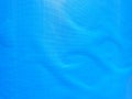 Tarp, shaded blue tarp. Background of strong, flexible, waterproof material