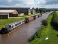 TARPORLEY, CHESHIRE/UK - SEPTEMBER 16 : Narrow Boats Moored along the Shropshire Union Canal at Tarporley in Cheshire on Royalty Free Stock Photo