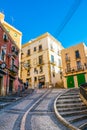 TARRAGONA, SPAIN, DECEMBER 29, 2015: people are strolling through a colorful narrow street in the historical center of Royalty Free Stock Photo