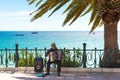 TARRAGONA, SPAIN - MAY 1, 2017: Musician on the waterfront plays the accordion. Copy space for text.
