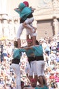 Tarragona, Spain, September 19, 2019 - Children on top of human castells tower