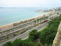 Tarragona, Spain - 06,07,2022: A view of the coast of Tarragona, in Spain, and its Passeig Maritim promenade near Mediterranean