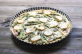 Tart with asparagus, smoked cheese and ham on wooden table Royalty Free Stock Photo