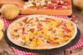 Tart with fried potato, raclette cheese and smoke flavour bacon. Royalty Free Stock Photo