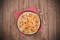 Tart with fried potato, raclette cheese and smoke flavour bacon. Royalty Free Stock Photo