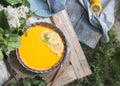 Tart with lemon curd. Lemon pie. American cuisine. Dessert. Natural garden. top view