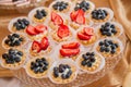 Tart-lets with whipped cream and fruit