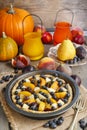 Tart with peach, pumpkin, plum, pear and blueberry in autumn set Royalty Free Stock Photo