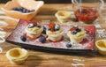 Tart stuffed with cream, berries and jam of fresh strawberries Royalty Free Stock Photo