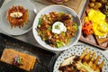 Tart tatin, Salade Lyonnaise, Bacon Et uf Poche, Millefeuille Praline, Eggs Provencal, Roasted Guinea Fowl Breast, Metro Cheese Royalty Free Stock Photo